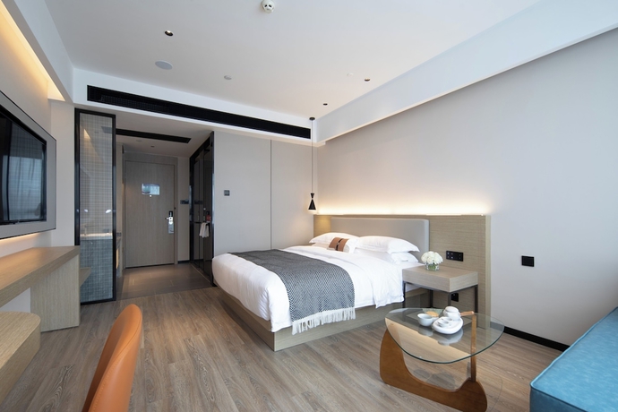 Imagen de la habitación del Hotel Yishang. Foto 7