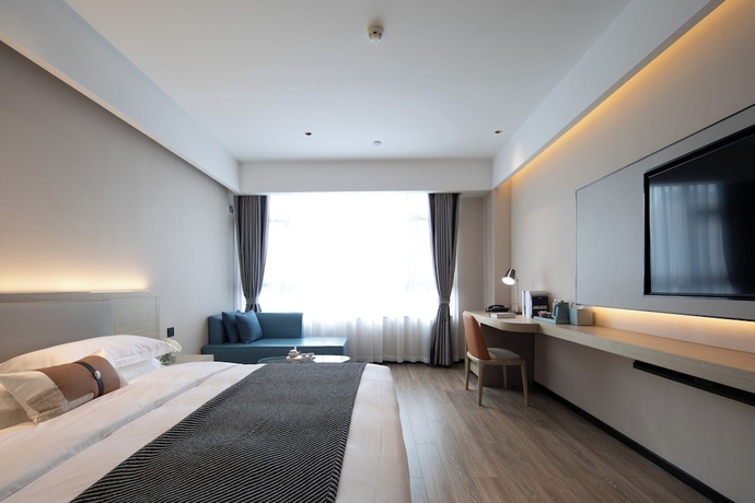 Imagen de la habitación del Hotel Yishang. Foto 8