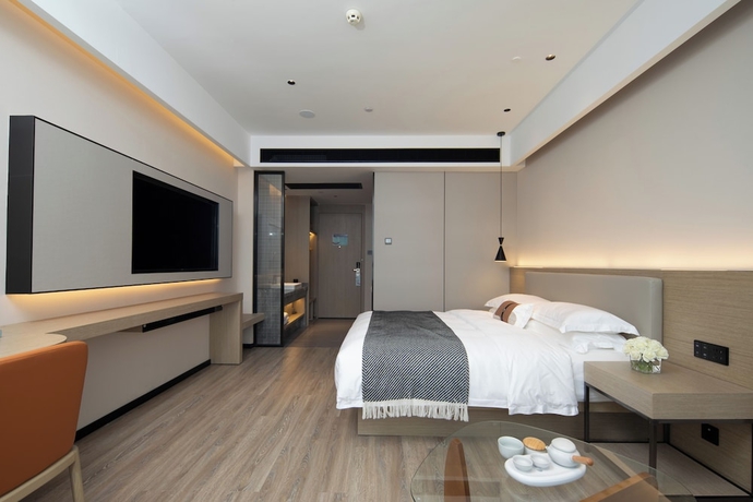 Imagen de la habitación del Hotel Yishang. Foto 9