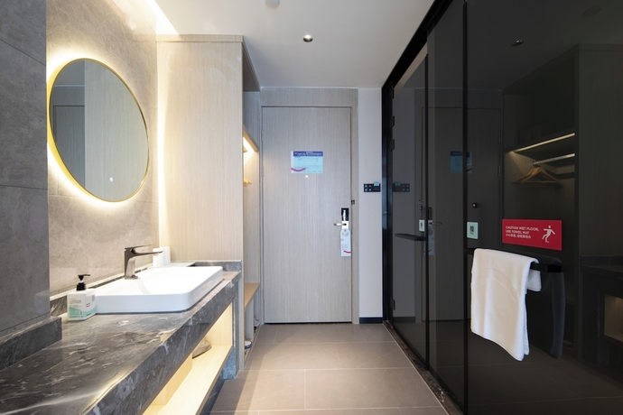Imagen de la habitación del Hotel Yishang. Foto 10