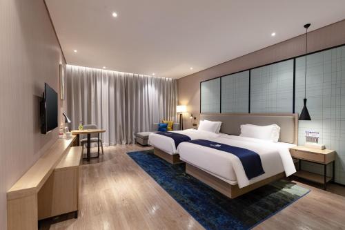 Imagen de la habitación del Hotel Yishang - Foshan Jiakou Metro Station Jiazhou Plaza. Foto 17