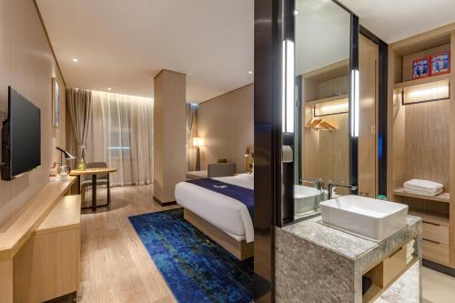 Imagen de la habitación del Hotel Yishang - Foshan Jiakou Metro Station Jiazhou Plaza. Foto 20