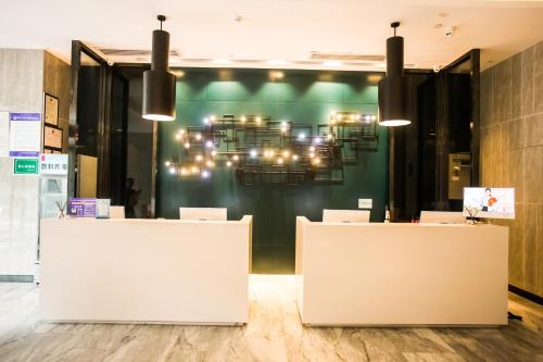 Imagen general del Hotel Yishang - Jingmen Yintai City Jingchu Institute of Technology. Foto 4