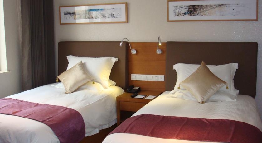 Imagen de la habitación del Hotel Yitel Beijing Jiuxian Bridge. Foto 3