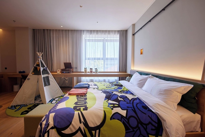 Imagen de la habitación del Hotel Yitel Shanghai. Foto 6