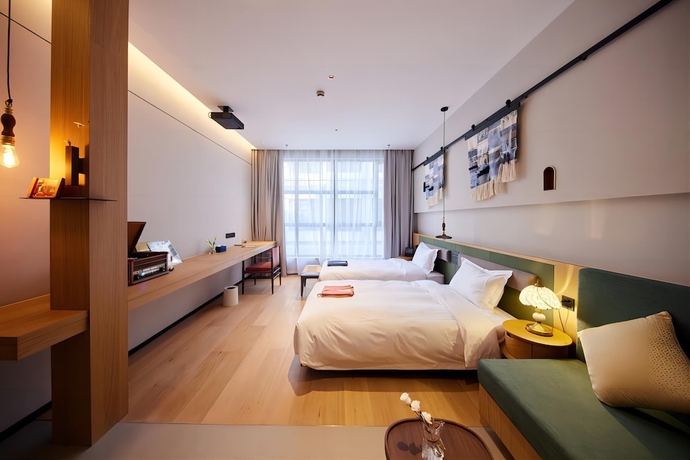 Imagen de la habitación del Hotel Yitel Shanghai. Foto 8