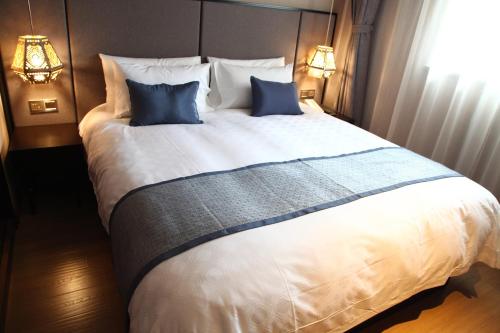 Imagen de la habitación del Hotel Yitel Shanghai Zhongshan Park. Foto 6