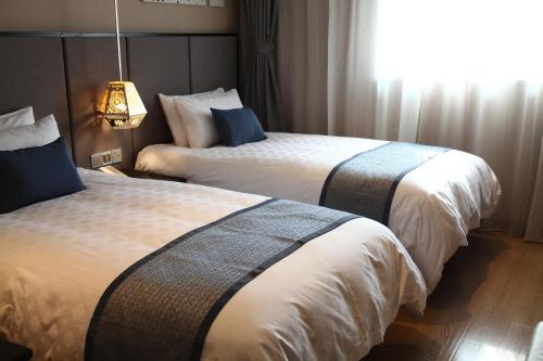 Imagen de la habitación del Hotel Yitel Shanghai Zhongshan Park. Foto 8