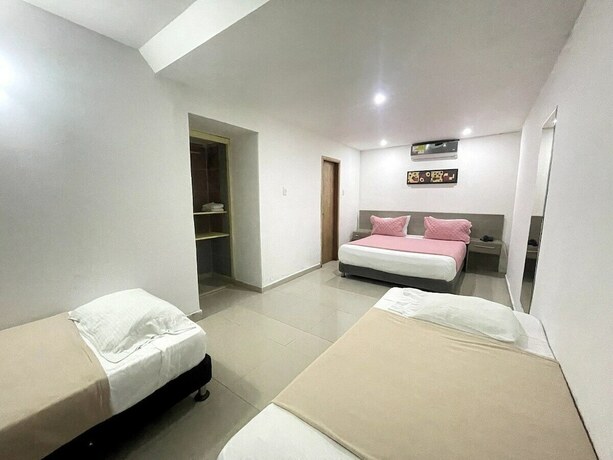 Imagen de la habitación del Hotel Yivinaca, Barranquilla. Foto 15