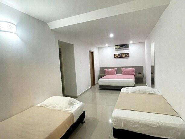 Imagen de la habitación del Hotel Yivinaca, Barranquilla. Foto 16
