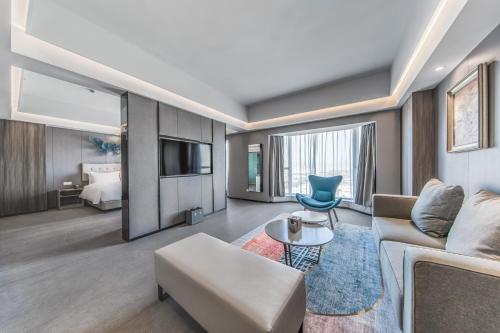 Imagen de la habitación del Hotel Yiwo Zhishang. Foto 18