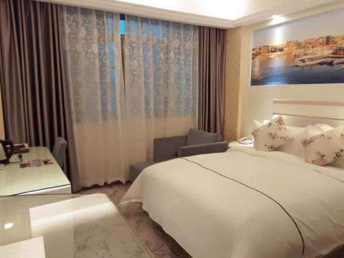 Imagen de la habitación del Hotel Yiwu Baide Theme. Foto 6