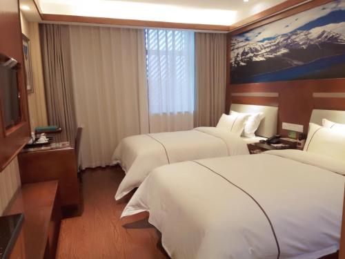 Imagen de la habitación del Hotel Yiwu Baide Theme. Foto 7