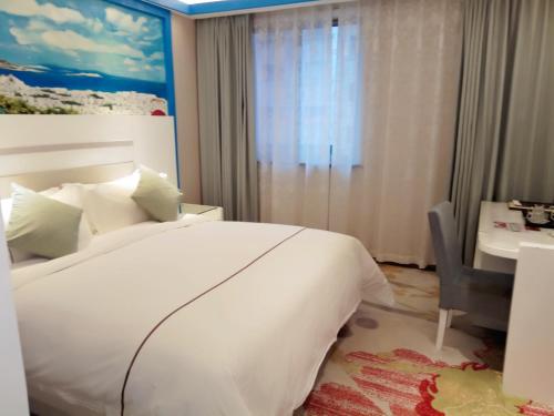 Imagen de la habitación del Hotel Yiwu Baide Theme. Foto 8