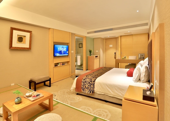 Imagen de la habitación del Hotel Yiwu Bali Plaza. Foto 4