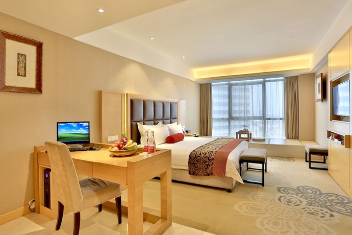 Imagen de la habitación del Hotel Yiwu Bali Plaza. Foto 5