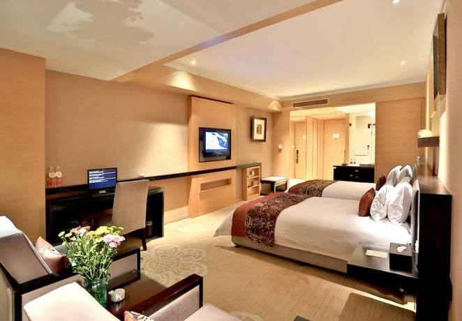 Imagen de la habitación del Hotel Yiwu Bali Plaza. Foto 6
