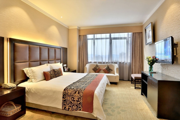 Imagen de la habitación del Hotel Yiwu Bali Plaza. Foto 8