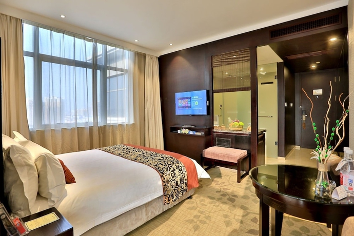 Imagen de la habitación del Hotel Yiwu Bali Plaza. Foto 13