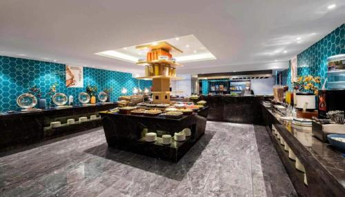Imagen general del Hotel Yiwu Bo Yi Mei Ju (International Trade Center). Foto 1