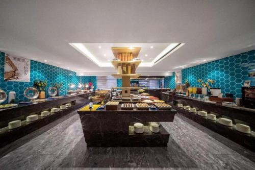 Imagen general del Hotel Yiwu Bo Yi Mei Ju (International Trade Center). Foto 4