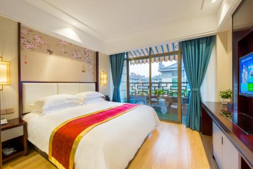 Imagen de la habitación del Hotel Yiwu Boting. Foto 17