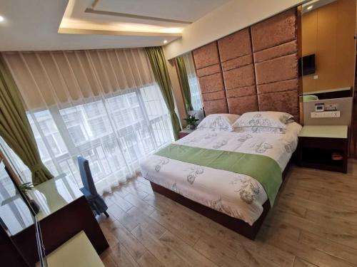 Imagen general del Hotel Yiwu Chuzhou Business. Foto 8