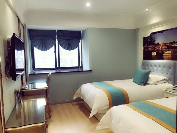 Imagen de la habitación del Hotel Yiwu Defeng. Foto 9