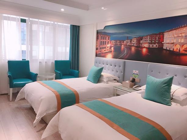 Imagen de la habitación del Hotel Yiwu Defeng. Foto 11