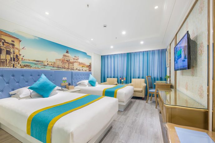 Imagen de la habitación del Hotel Yiwu Defeng. Foto 14