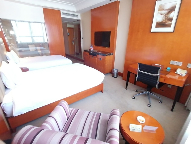 Imagen de la habitación del Hotel Yiwu. Foto 2