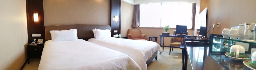 Imagen de la habitación del Hotel Yiwu. Foto 6