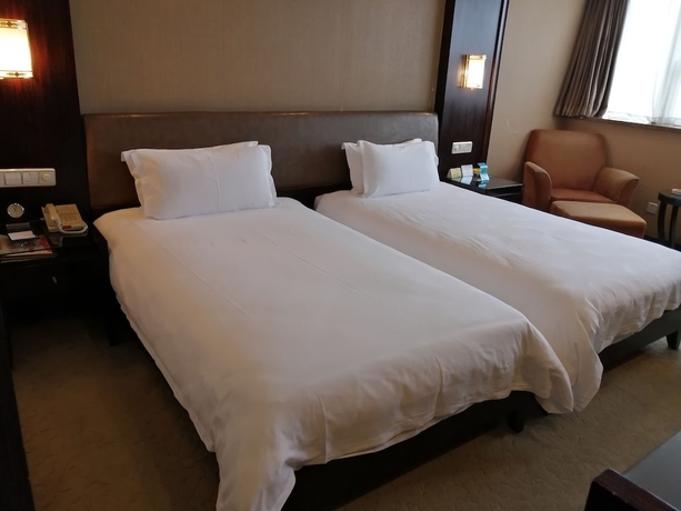 Imagen de la habitación del Hotel Yiwu. Foto 7