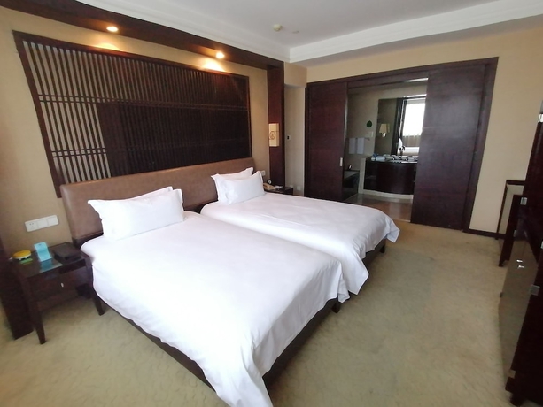 Imagen de la habitación del Hotel Yiwu. Foto 10