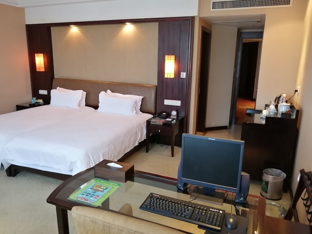 Imagen de la habitación del Hotel Yiwu. Foto 11