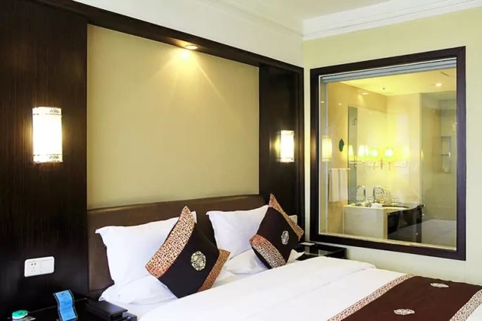 Imagen de la habitación del Hotel Yiwu. Foto 12