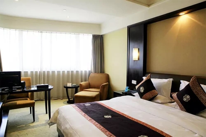 Imagen de la habitación del Hotel Yiwu. Foto 13
