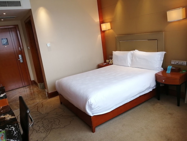 Imagen de la habitación del Hotel Yiwu. Foto 14