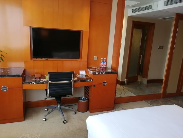 Imagen de la habitación del Hotel Yiwu. Foto 15