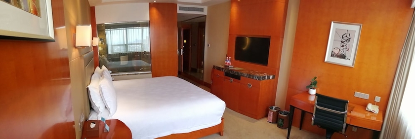 Imagen de la habitación del Hotel Yiwu. Foto 16