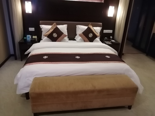 Imagen de la habitación del Hotel Yiwu. Foto 18