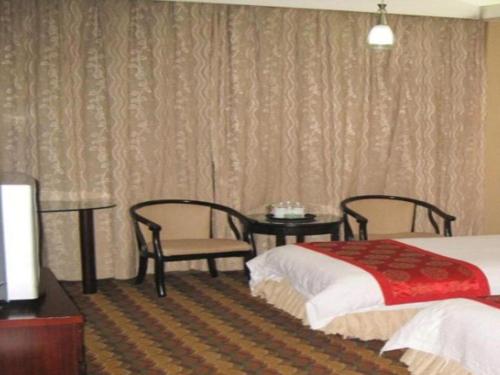 Imagen general del Hotel Yiwu Guomao. Foto 13