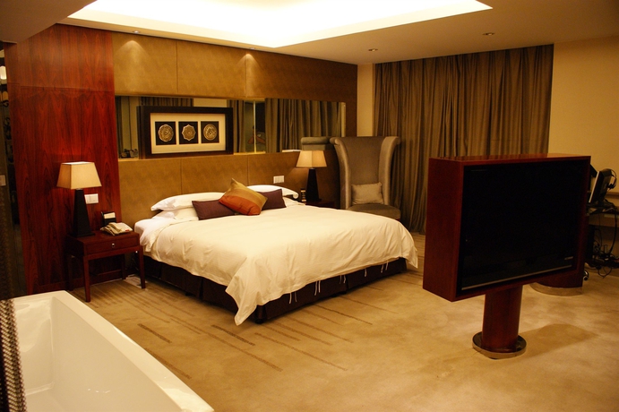 Imagen de la habitación del Hotel Yiwu International Mansion. Foto 4