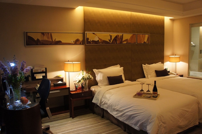 Imagen de la habitación del Hotel Yiwu International Mansion. Foto 5