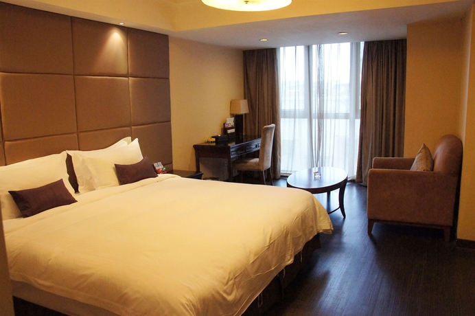 Imagen de la habitación del Hotel Yiwu International Mansion. Foto 9