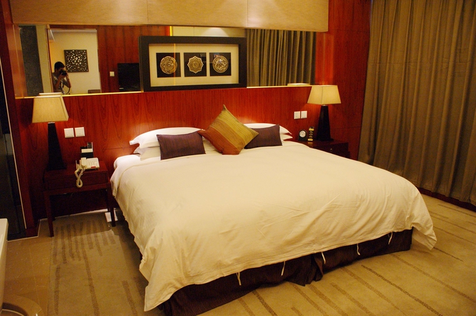 Imagen de la habitación del Hotel Yiwu International Mansion. Foto 13