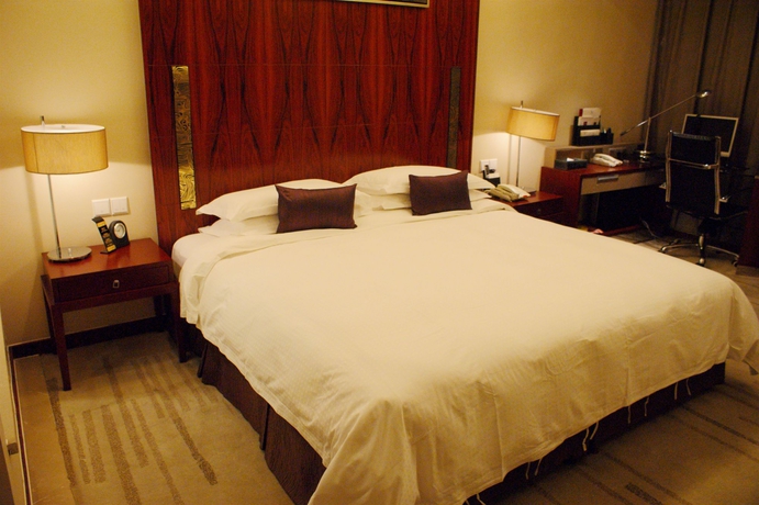 Imagen de la habitación del Hotel Yiwu International Mansion. Foto 14