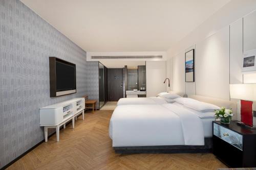 Imagen de la habitación del Hotel Yiwu Kaison K. Foto 15