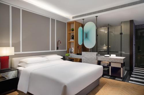 Imagen de la habitación del Hotel Yiwu Kaison K. Foto 16