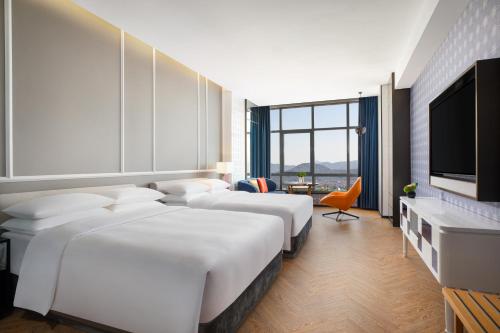 Imagen de la habitación del Hotel Yiwu Kaison K. Foto 18